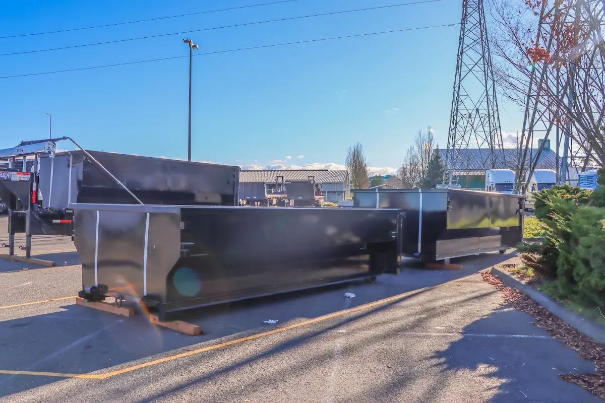 Roll-off dumpster ready for waste disposal at job site for 12 Yard Dumpster Rental in Summit View